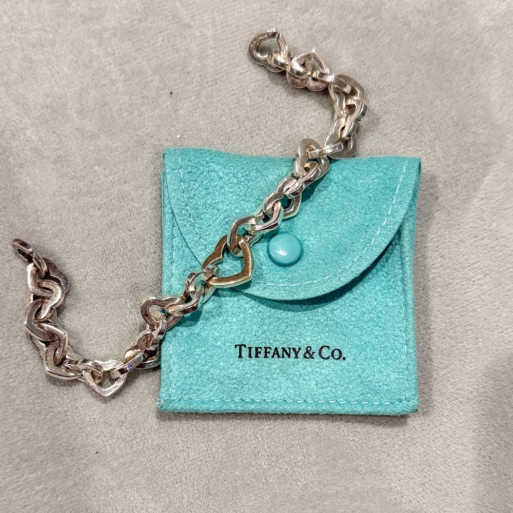 Tiffany & Co steeling silver & 18k gold hearts link bracelet